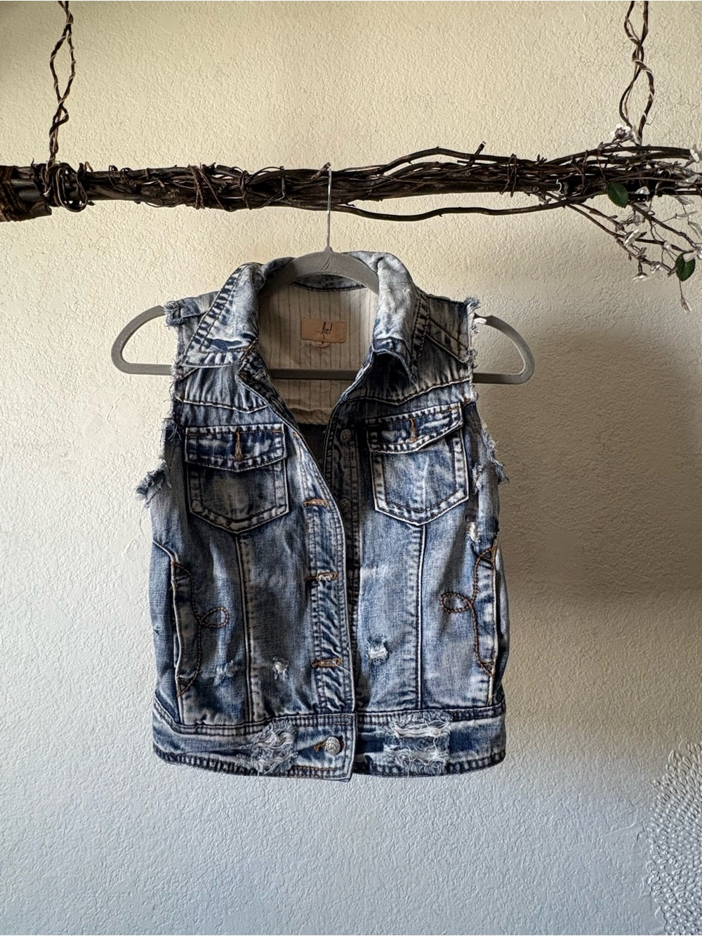 ...lost distressed denim vest
